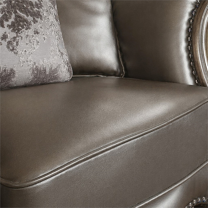 Bowery Hill Wing Back Chair in Silver Faux Leather with Antique Platinum Trim