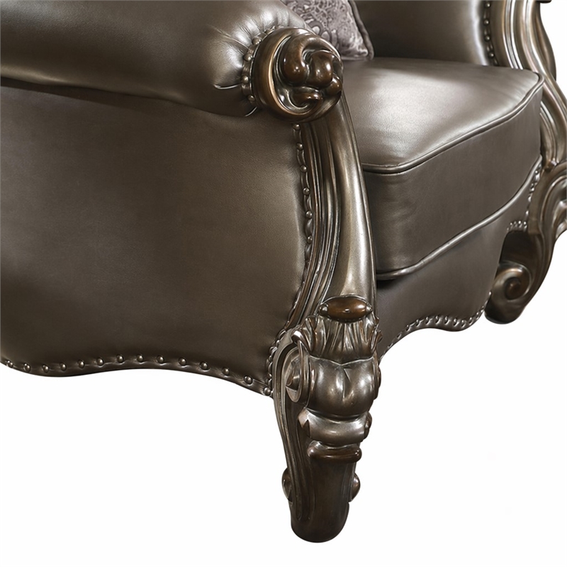 Bowery Hill Wing Back Chair in Silver Faux Leather with Antique Platinum Trim