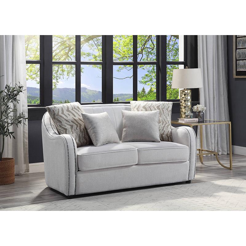 Bowery Hill Beige Linen Loveseat with Nailhead Trim and Pillows