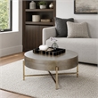 Bowery Hill Round Coffee Table with 1 Drawer and Champagne Metal Base