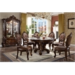 Bowery Hill Round Dining Table with Decorative Base in Cherry Finish