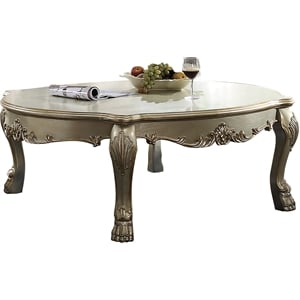 Bowery Hill Oval Arched Top Wooden Coffee Table in Gold Patina and Bone