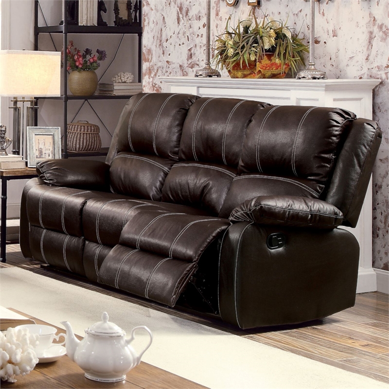 Bowery Hill Contemporary PU Faux Leather Upholstered Motion Sofa in Brown