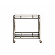 Bowery Hill Rectangular Metal Mirror Top Serving Cart in Antique Brass