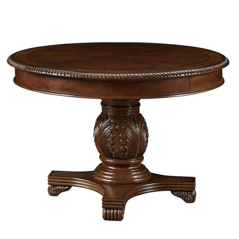 Bowery Hill Round Single Pedestal Dining Table with Removable Leaf in Cherry