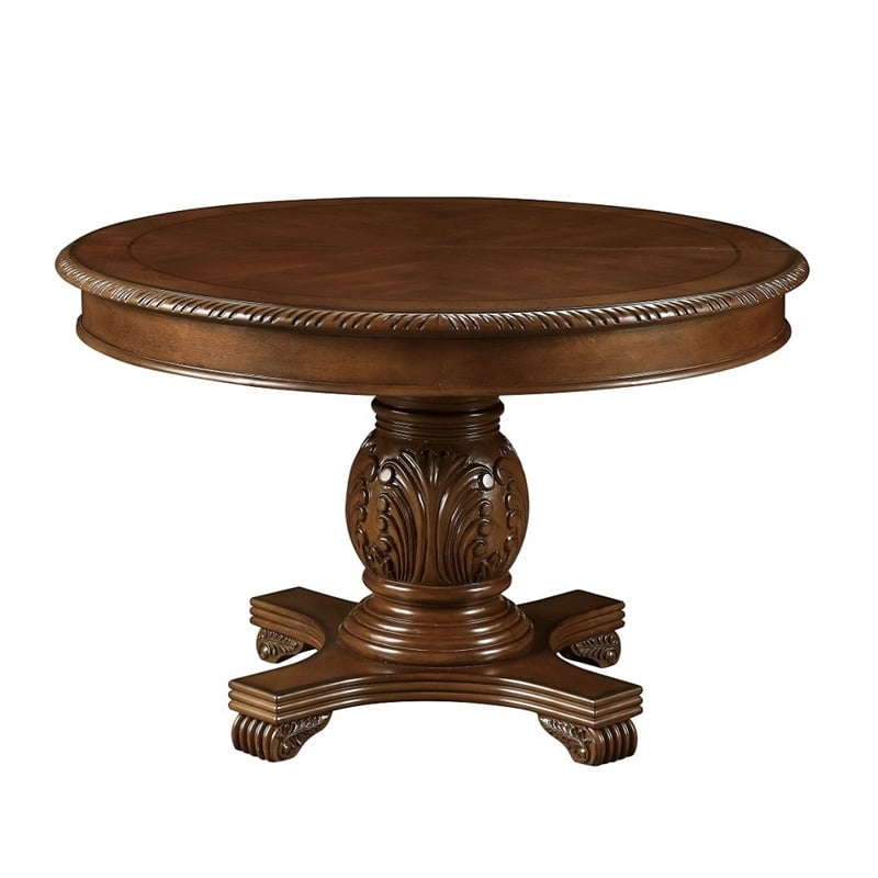 Bowery Hill Round Single Pedestal Dining Table with Removable Leaf in Cherry