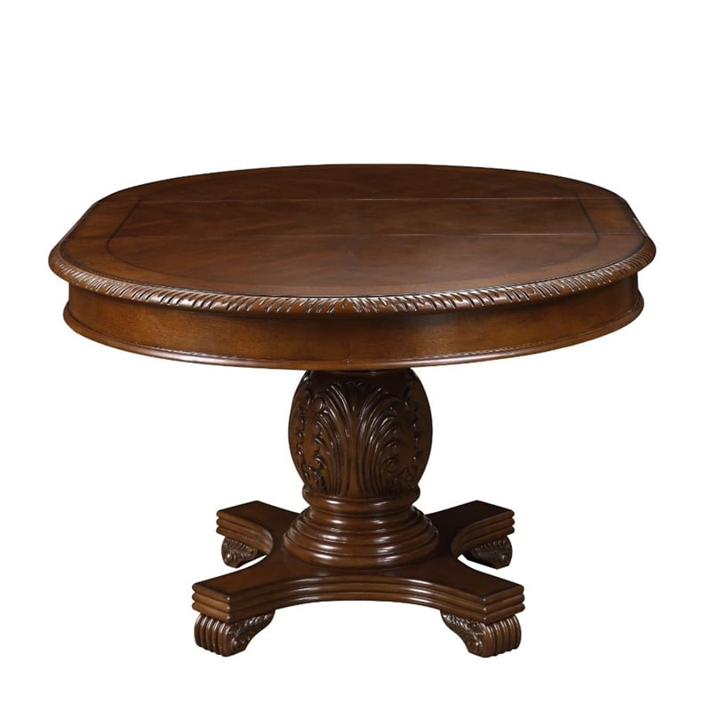 Bowery Hill Round Single Pedestal Dining Table with Removable Leaf in Cherry