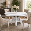 Bowery Hill Round Pedestal Dining Table with Decorative Base