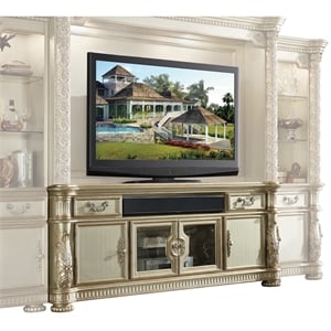 Bowery Hill Wooden TV Stand with Drawers and Doors in Gold Patina