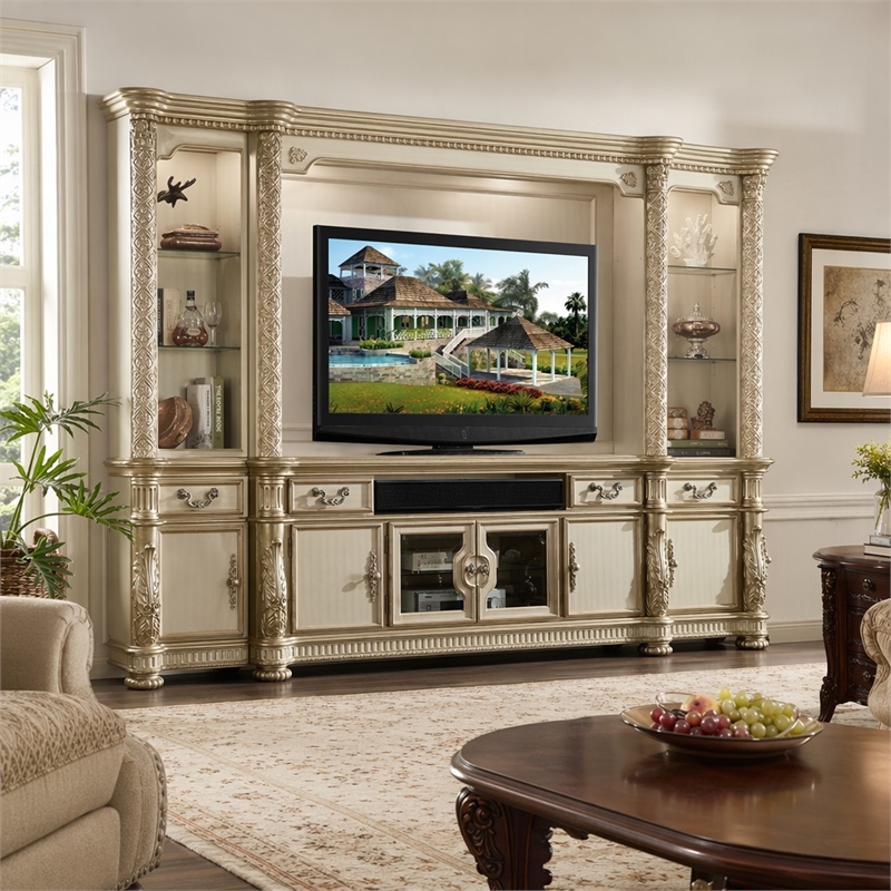 Bowery Hill Wooden TV Stand with Drawers and Doors in Gold Patina
