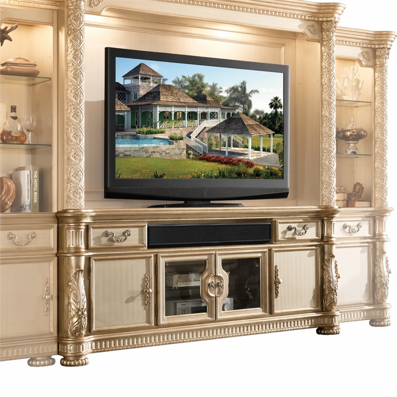Bowery Hill Wooden TV Stand with Drawers and Doors in Gold Patina