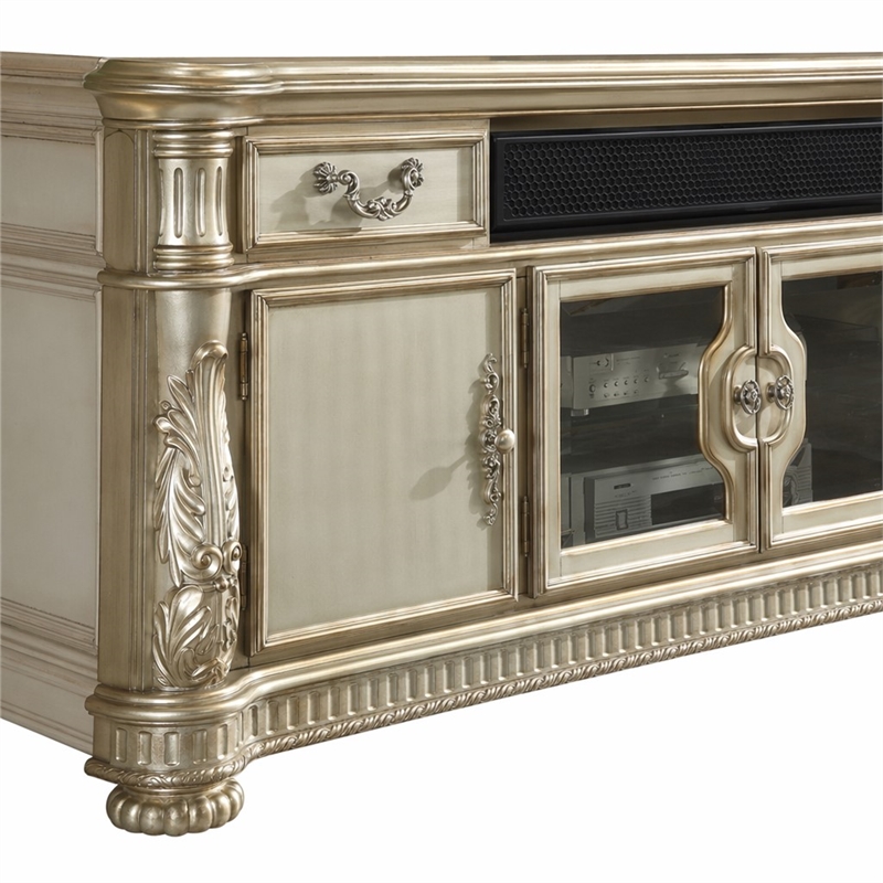 Bowery Hill Wooden TV Stand with Drawers and Doors in Gold Patina