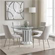 Bowery Hill Round Glass Top Dining Table with Cross Oval Base in Silver