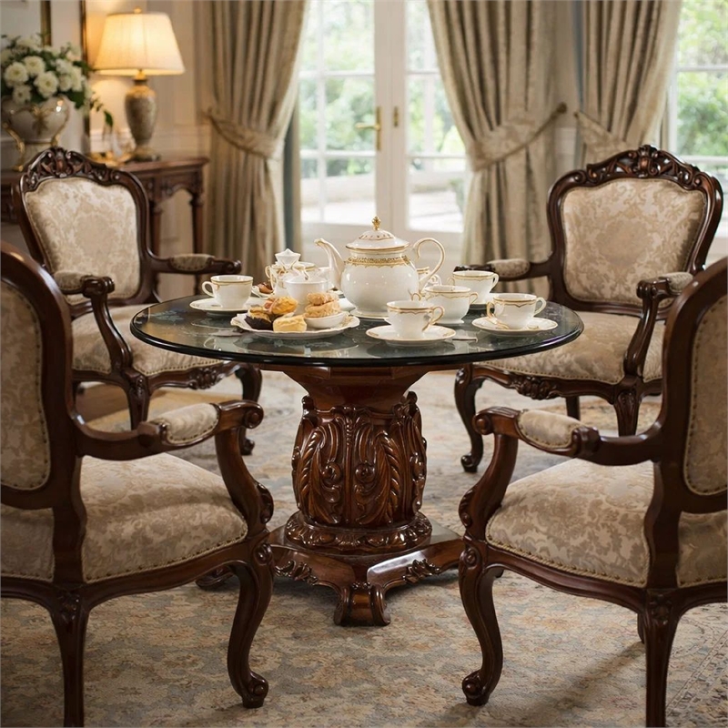 Bowery Hill Dining Table with Glass Top and Pedestal Base in Cherry Brown