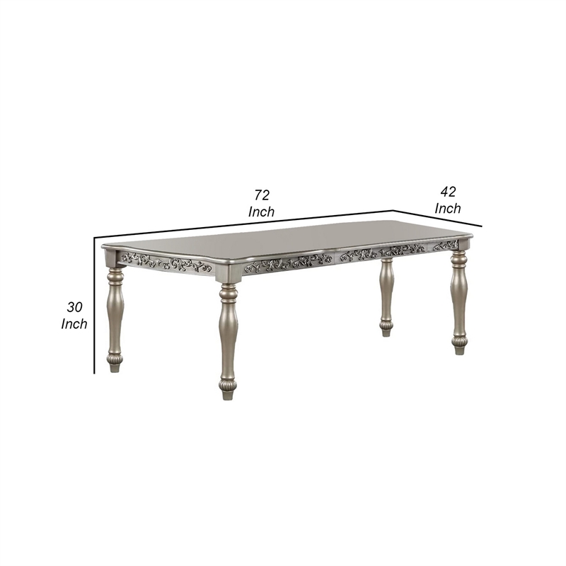 Bowery Hill 72 Inch Dining Table with Floral Carved Legs in Champagne