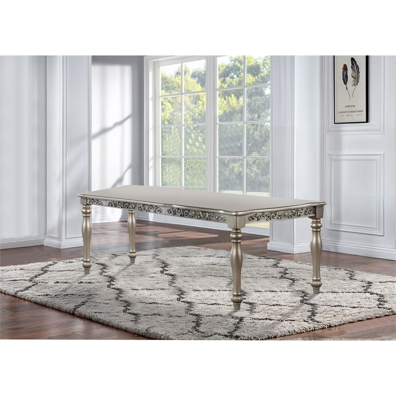 Bowery Hill 72 Inch Dining Table with Floral Carved Legs in Champagne