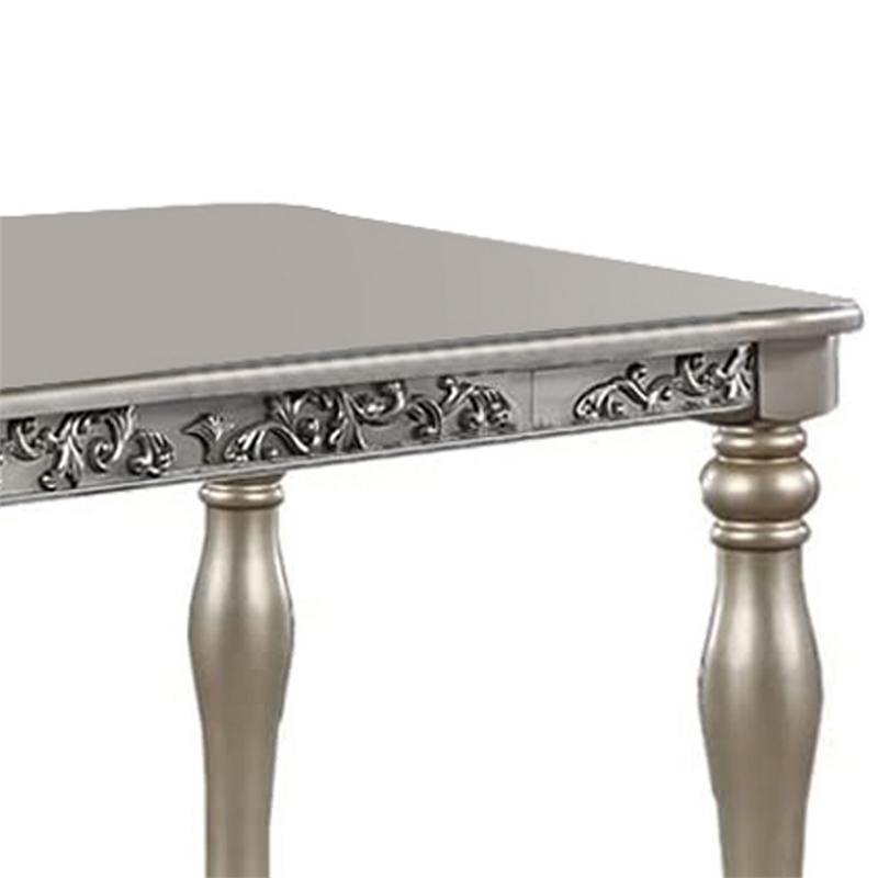 Bowery Hill 72 Inch Dining Table with Floral Carved Legs in Champagne