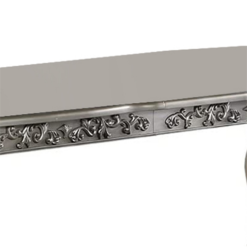 Bowery Hill 72 Inch Dining Table with Floral Carved Legs in Champagne