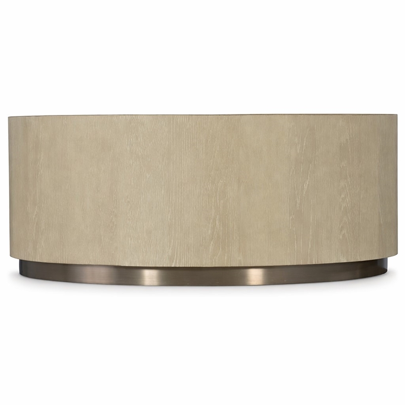 Bowery Hill Round Cocktail Table with Champagne Metal Base in Taupe