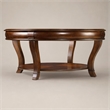 Bowery Hill Round Glass Cocktail Table with Starburst Inlay in Clear