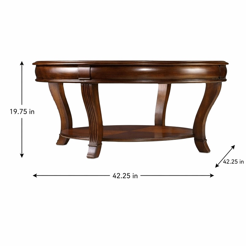 Bowery Hill Round Glass Cocktail Table with Starburst Inlay in Clear