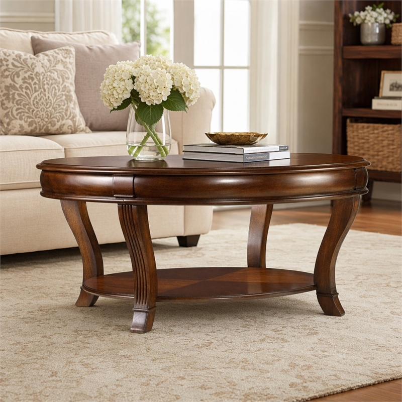 Bowery Hill Round Glass Cocktail Table with Starburst Inlay in Clear