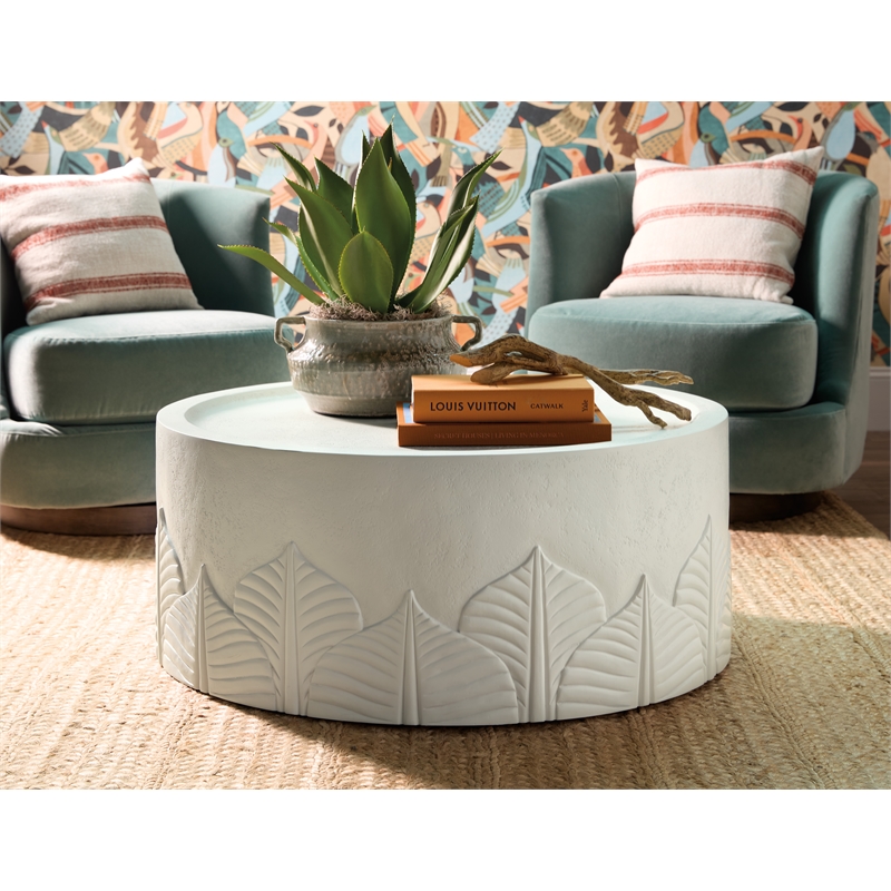 Bowery Hill Round Cocktail Table in White Wood with Embossed Finish