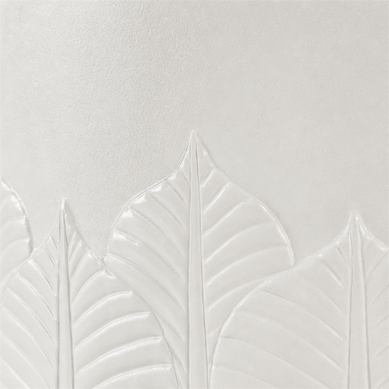 Bowery Hill Round Cocktail Table in White Wood with Embossed Finish