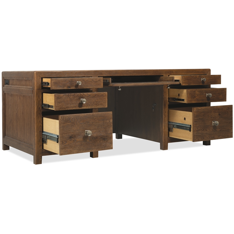 Bowery Hill 7 Drawer Executive Desk in Worn Saddle Brown Wood Finish