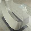 Bowery Hill Glass Top Dining Table with Stainless Steel Base in Silver