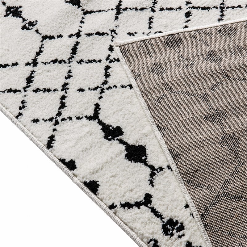 Bowery Hill 8' x 10' Geometric Polyester Area Rug in Ivory and Black