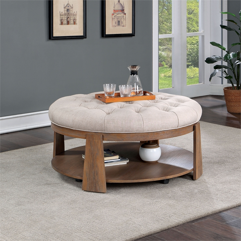 Bowery Hill Round Wood Coffee Table with Game Storage in Beige