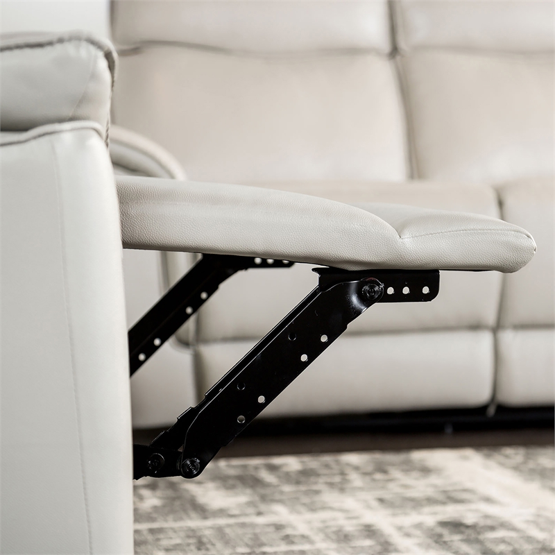 Bowery Hill Leather Padded Reclining Loveseat in Taupe