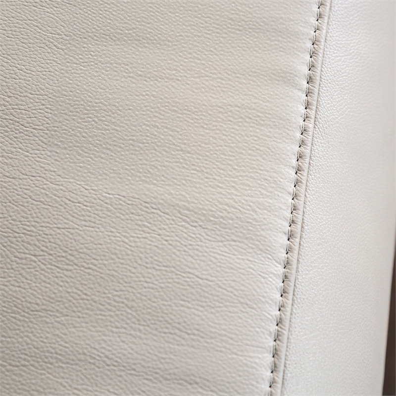 Bowery Hill Leather Padded Reclining Loveseat in Taupe