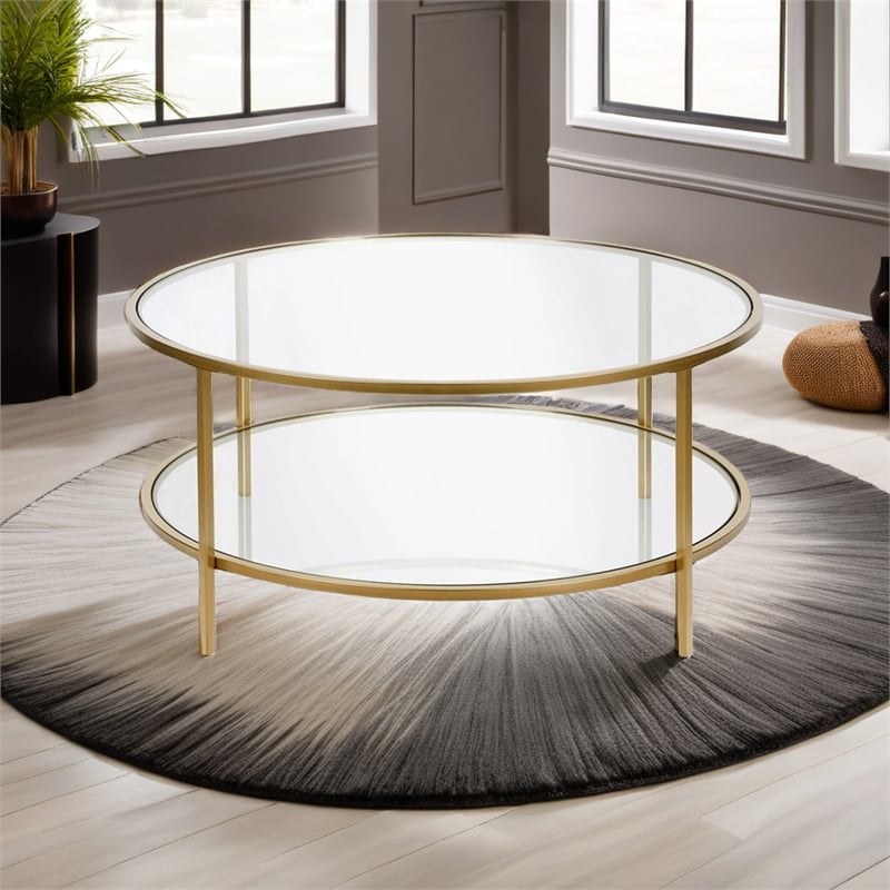 Pemberly Row Round Metal Base Coffee Table in Brass with Glass Top