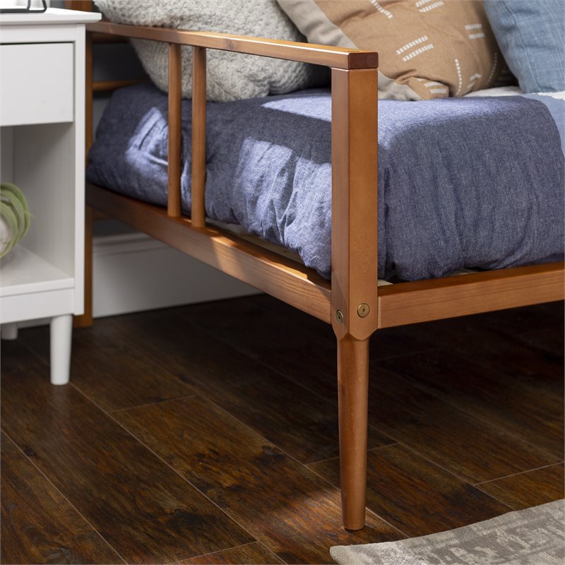 Pemberly Row Spindle Tapered Front Legs Solid Wood Daybed in Brown/Caramel