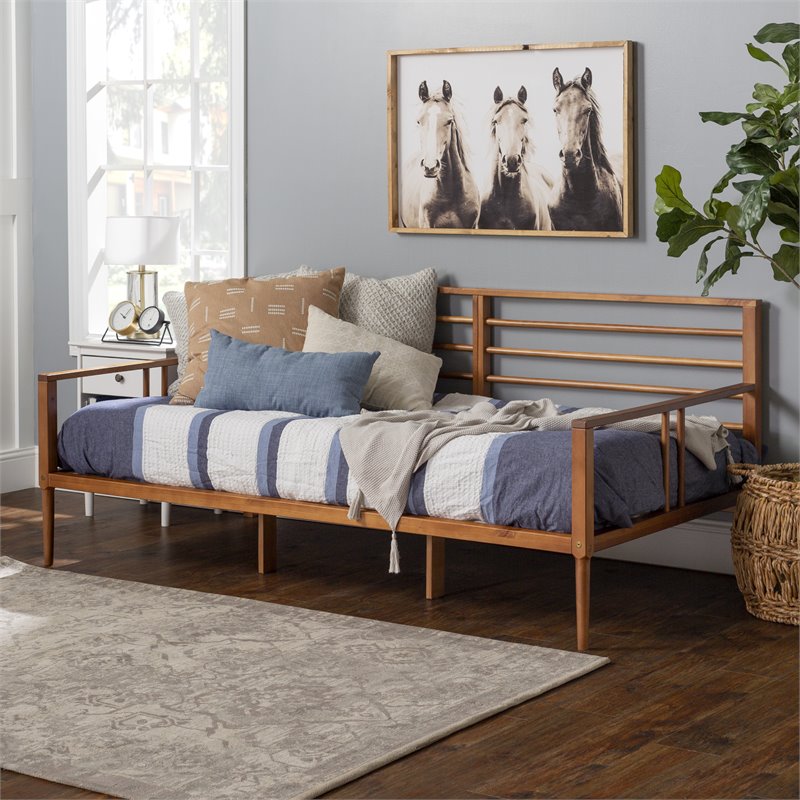 Pemberly Row Spindle Tapered Front Legs Solid Wood Daybed in Brown/Caramel