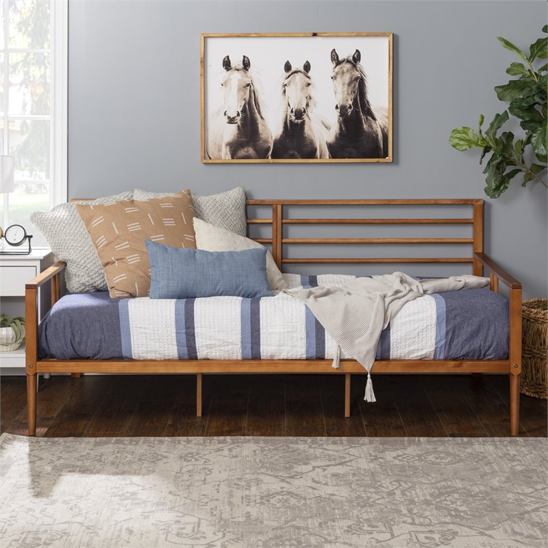 Pemberly Row Spindle Tapered Front Legs Solid Wood Daybed in Brown/Caramel