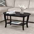 Pemberly Row Oval Coffee Table with Shelf in Black Wood Finish