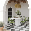 Pemberly Row Oval Faux Plaster & Stone Dining Table in White