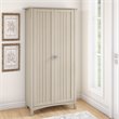 Pemberly Row Tall Storage Cabinet with Doors in Antique White