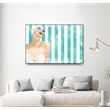 Pemberly Row Canvas 36x24 Bathing Beauty On Teal Towel Framed in Multi-Color