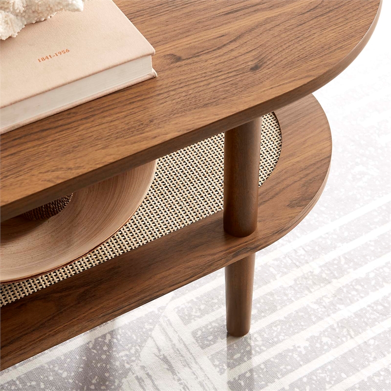 Pemberly Row Oval Wood Coffee Table with Lower Rattan Shelf in Walnut