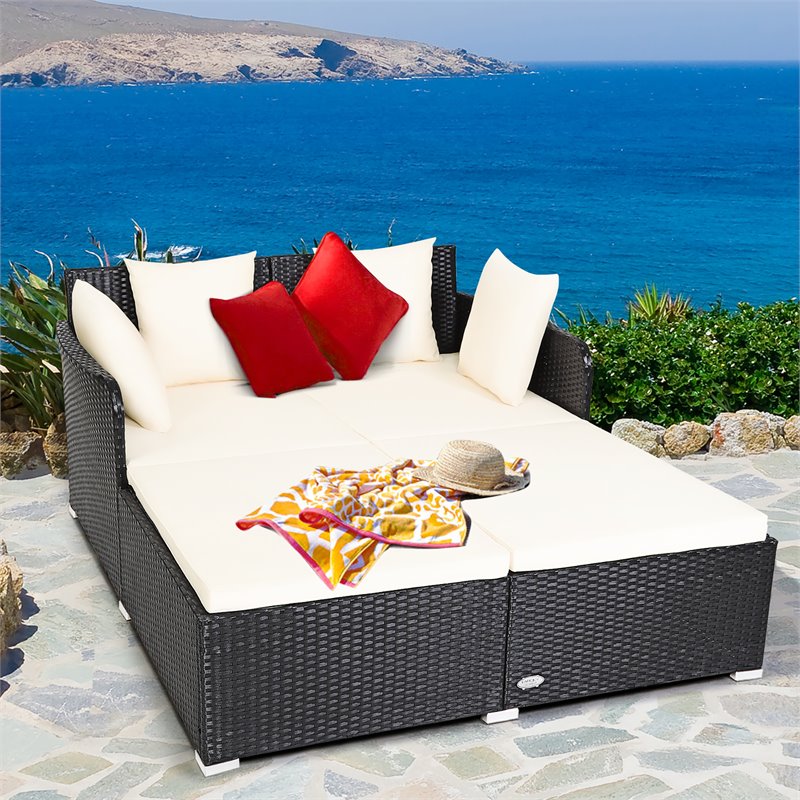 Pemberly Row Patio Rattan Cushioned Sofa Daybed with Pillows in Beige