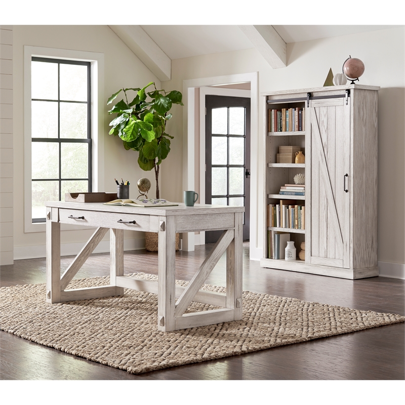 Pemberly Row 8-Shelf Wood Bookcase with Sliding Door in White