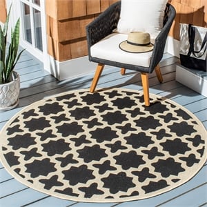 Pemberly Row Polypropylene Black Indoor Outdoor Rug - Round 4'