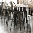 Pemberly Row All-Weather Bar Height Stool with Poly Resin Seat in Copper/Black