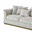 Pemberly Row Upholstered Sofa with Brushed Gold Metal Frame in Cream