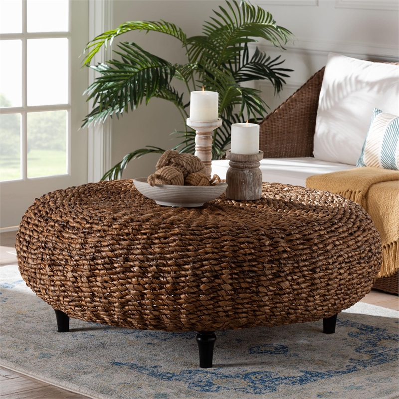 Pemberly Row Handwoven Seagrass Round Coffee Table with Turned Legs