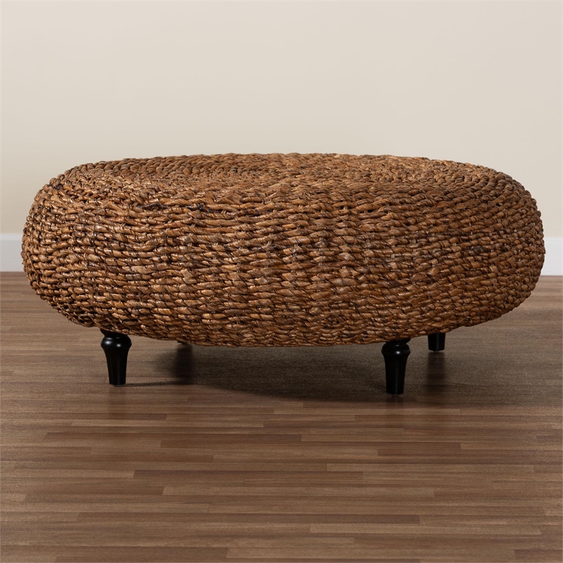 Pemberly Row Handwoven Seagrass Round Coffee Table with Turned Legs